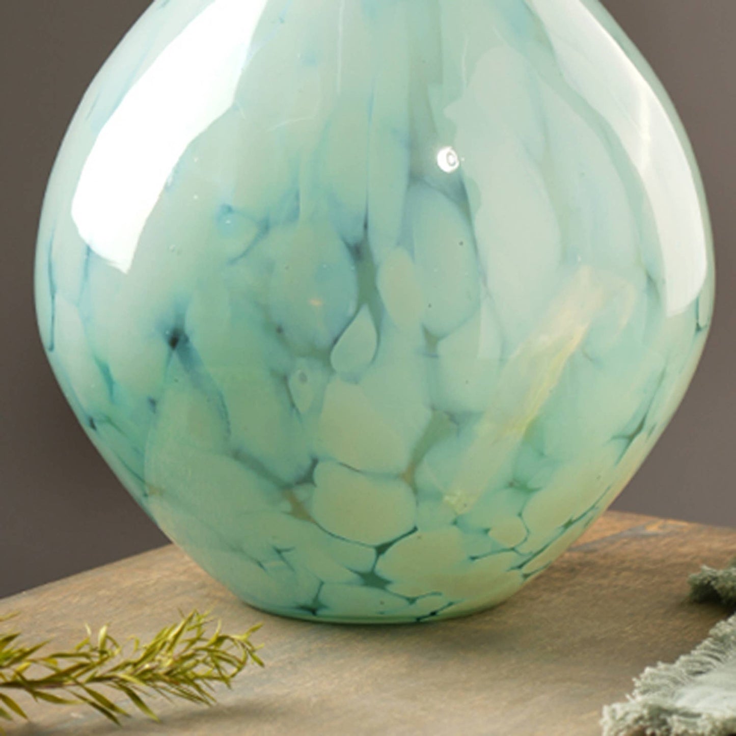 WHITE SPLUTTER GREEN GLASS ROUNDED VASE