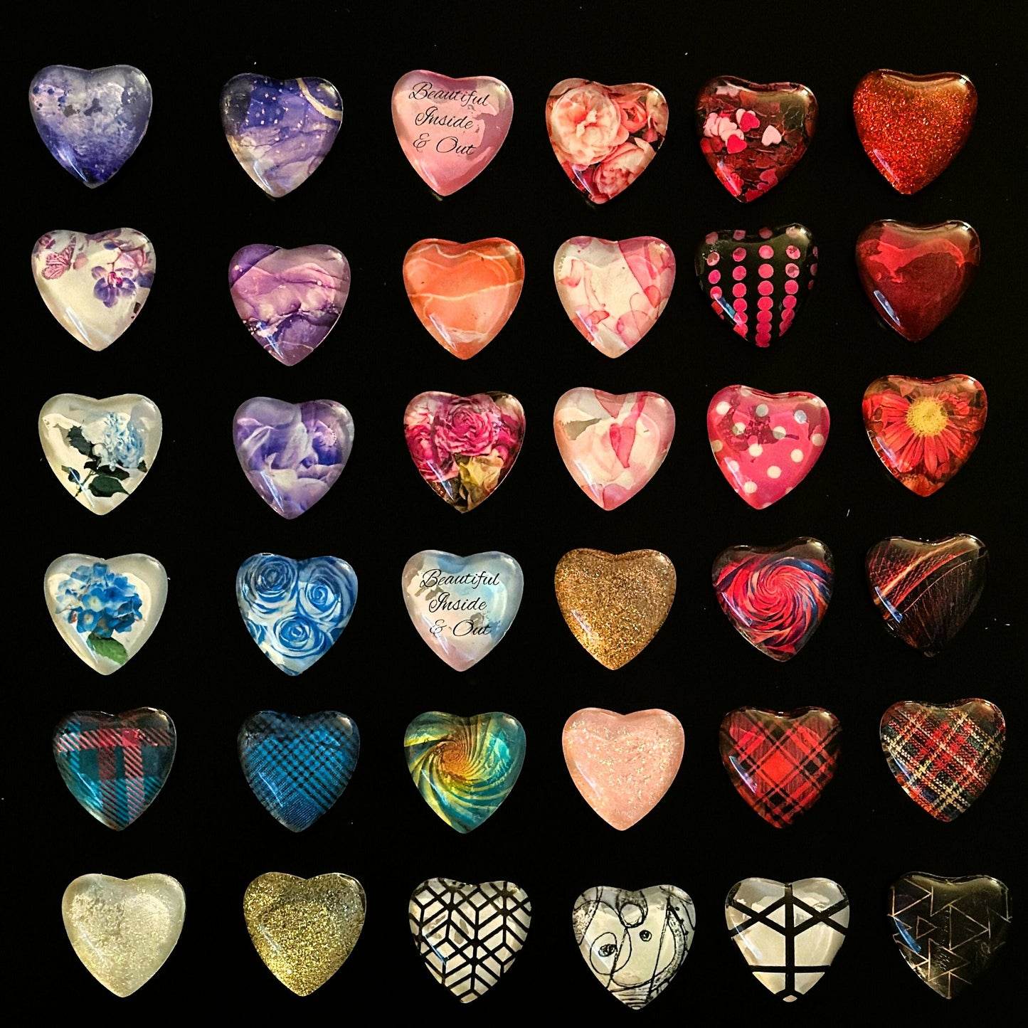 heart-magnets-assorted-dark-background