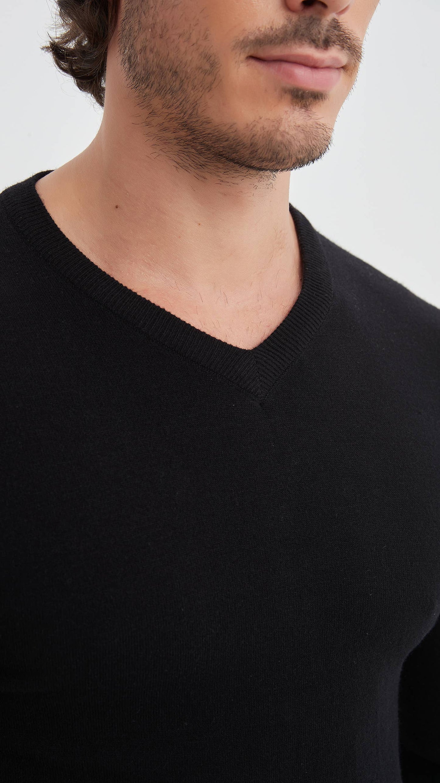 Black V-neck sweater