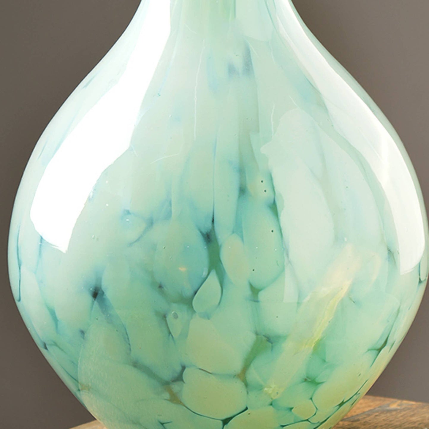 WHITE SPLUTTER GREEN GLASS ROUNDED VASE